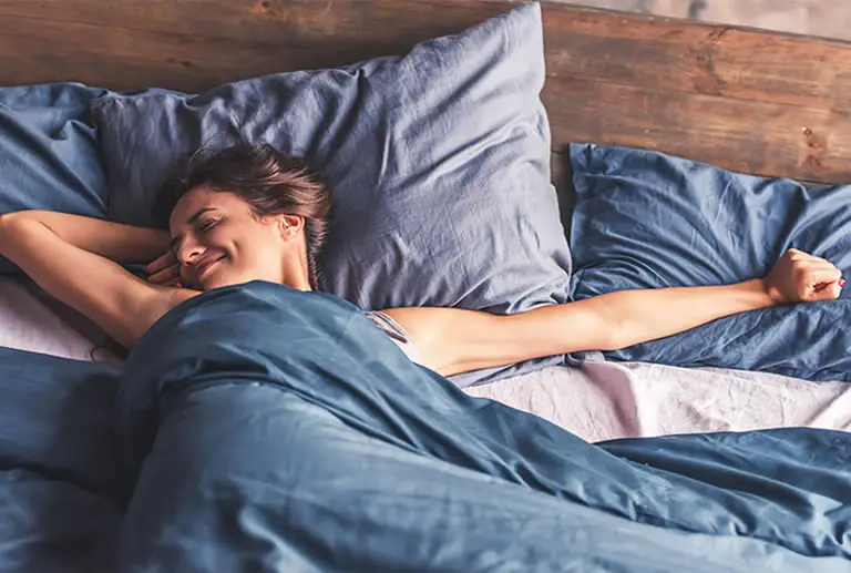Woman smiling after sinful lucid dream