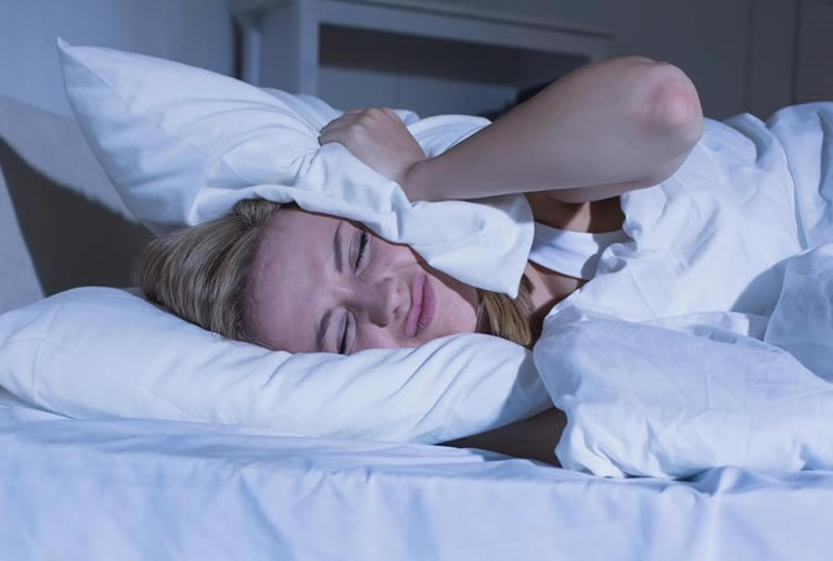 Woman frustrated with lack of control in lucid dream