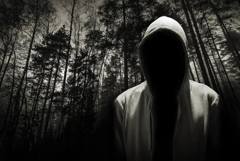 Hooded guy in lucid dream nightmare