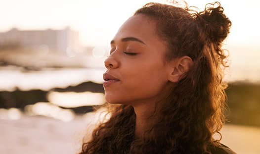 Woman visualizing a different reality