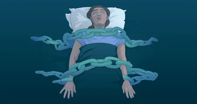 Woman experiencing sleep paralysis